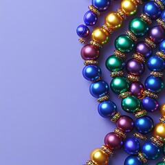 Fototapeta premium Colorful beaded strands on purple backdrop