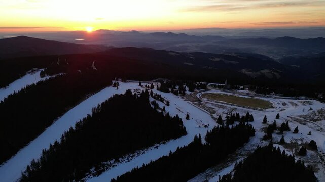 Aerial drone morning view of ski resort Rogla at sunrise dawn. Panoramic winter shot of Ski center Rogla, Slovenia