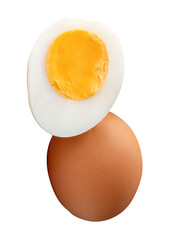 Front view of raw brown chicken eggs and cooked or boiled chicken egg with egg yolk in half in stack isolated on white background with clipping path