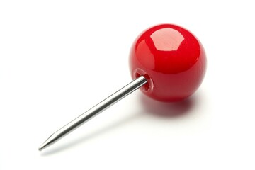 Close-up of a red pushpin on a white background, highlighting its glossy finish and sharp point