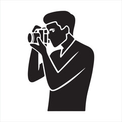 Photographer taking a picture in a silhouette
