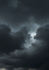 Obraz premium Stormy sky with dark rolling clouds and dramatic atmosphere