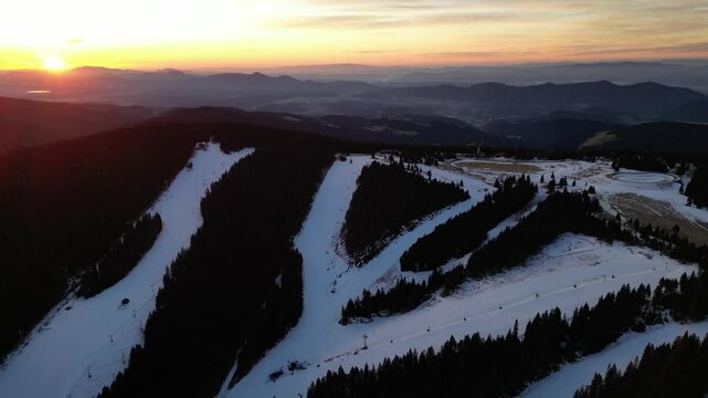 Aerial drone morning view of ski resort Rogla at sunrise dawn. Panoramic winter shot of Ski center Rogla, Slovenia