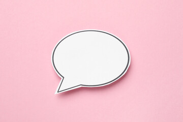 Blank speech bubble on light pink background. Space for text