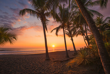 The sunset on the beach of Pacific ocean - Costa Rica