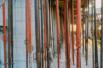 Obraz premium Red metal formwork for pouring the second floor of a monolithic house
