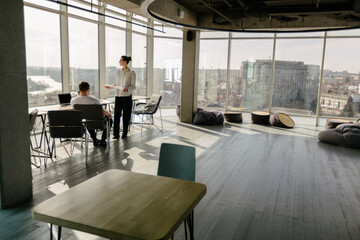 Two office workers working together 