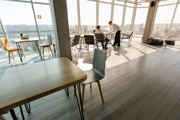 Two office workers working together 