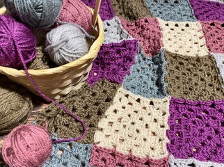 Crochet blanket granny squares clews and basket hobby handmade craft photo	
