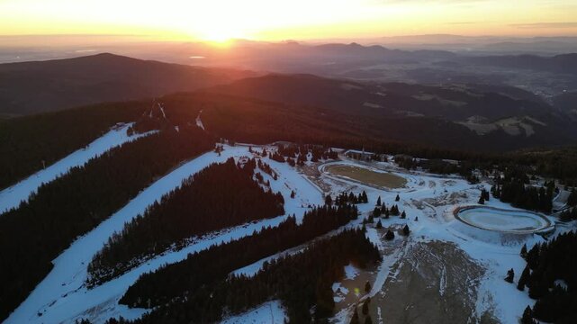 Aerial drone morning view of ski resort Rogla at sunrise dawn. Panoramic winter shot of Ski center Rogla, Slovenia