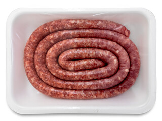 Italian pork sausage called Luganiga sealed in white plastic tray isolated