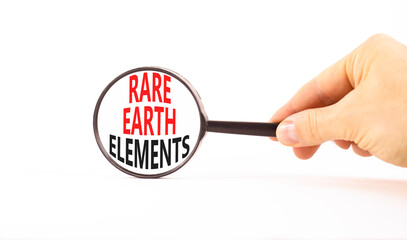 Rare earth elements symbol. Concept words Rare earth elements in beautiful magnifying glass....