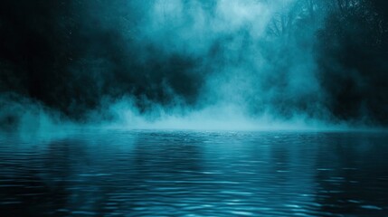 Mystical teal fog over still water at night.