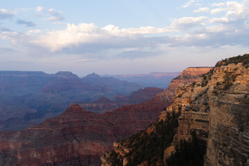 Fototapeta premium Grand Canyon National Park at sunset in July with cloudy sky