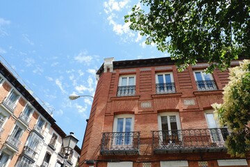Classical buildings made of bricks in Madrid, Spain. Spanish architecture