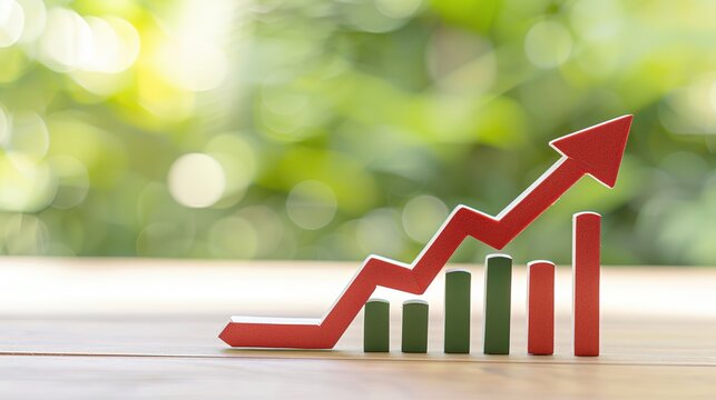Close-up of a downward arrow graph on a digital screen with financial charts, symbolizing an earnings miss, financial decline, and market analysis concepts.