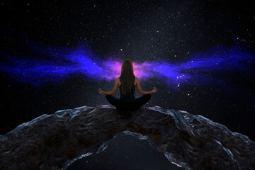 Photomontage of silhouette of woman with universe background	