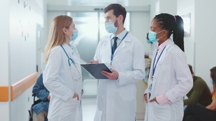 Healthcare Professionals Engaging in Meaningful Discussions About Patient Care in a Hospital Setting