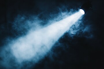 Obraz premium Abstract display of white spotlight cutting through smoke in a dark environment, Abstract white spot light with smoke
