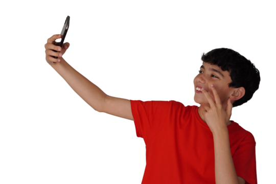 png, transparent background, isolated preteen boy taking a selfie with his mobile phone, smiling and making a victory gesture with two fingers
