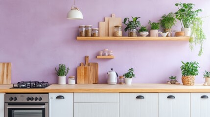 A modern kitchen displaying plants and kitchenware on shelves and counters