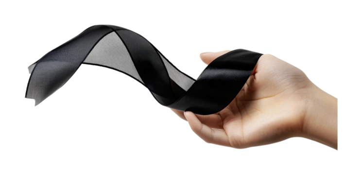 Hand holding flowing black ribbon against white background, cut out