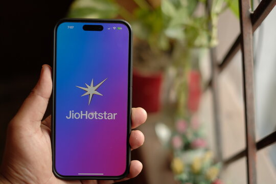 Jiohotstar app icon on Smartphone screen, JioHotstar is India's largest premium streaming platform : New Delhi, India - March 12 2025