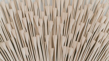 Detailed view of broom bristles reveals intricate textures and patterns, highlighting the artistry of natural materials in everyday objects