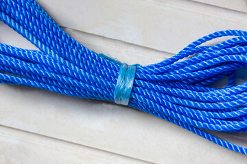 Closeup Of Blue Twisted Rope with Shiny Texture