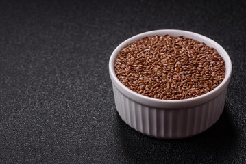 Flax seeds in a bowl, an ingredient for making vegan or vegetarian food
