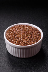Flax seeds in a bowl, an ingredient for making vegan or vegetarian food