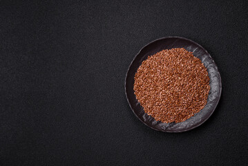 Flax seeds in a bowl, an ingredient for making vegan or vegetarian food