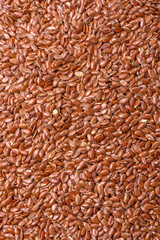 Flax seeds in a bowl, an ingredient for making vegan or vegetarian food