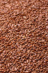 Flax seeds in a bowl, an ingredient for making vegan or vegetarian food