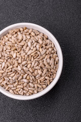 Peeled sunflower seeds in a bowl, an ingredient for making vegetarian food