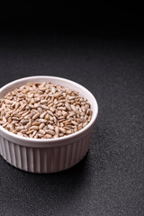 Peeled sunflower seeds in a bowl, an ingredient for making vegetarian food