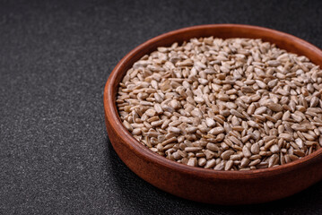 Peeled sunflower seeds in a bowl, an ingredient for making vegetarian food