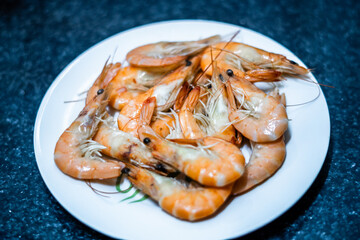 A plate with cooked prawns ready to eat