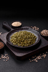 Peeled pumpkin seeds in a bowl, an ingredient for making vegetarian food