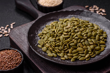 Peeled pumpkin seeds in a bowl, an ingredient for making vegetarian food