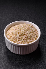 White sesame seeds in a bowl, an ingredient for making vegetarian food