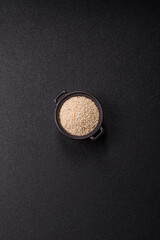 White sesame seeds in a bowl, an ingredient for making vegetarian food