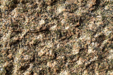 Close-up of natural stone patterns, showcasing unique textures, cracks, and organic formations. Ideal for background and texture