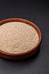 White sesame seeds in a bowl, an ingredient for making vegetarian food