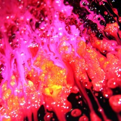 Abstract Image of Pink, Red, and Orange Liquid Mixture with Glitter