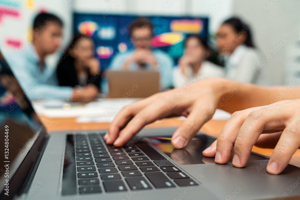 Poster closeup hand typing keyboard laptop with blurred background of business people using laptop to analy
