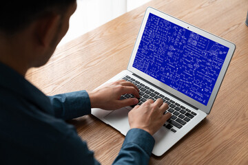 Mathematic equations and modish formula on computer screen showing concept of science and education