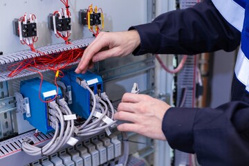 assembly of electrical cabinet components, installation of components in production, hands on site main plan