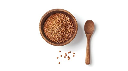 Raw seeds of orange lentils in wooden bowl spoon
