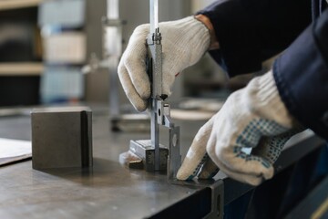 production and processing of metal, measurement of dimensions of the part